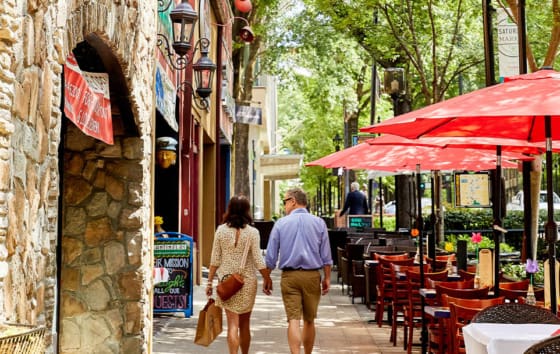 Couple walking down Main Street